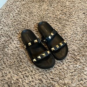 Black and gold sandals